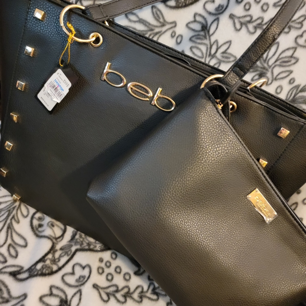 LARGE STUDDED NWT BEBE PURSE W ATTACHING WRISTLET